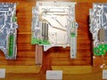 PlayStation 5 1200模型主板(中)及其前身(来源:Austin Evans)